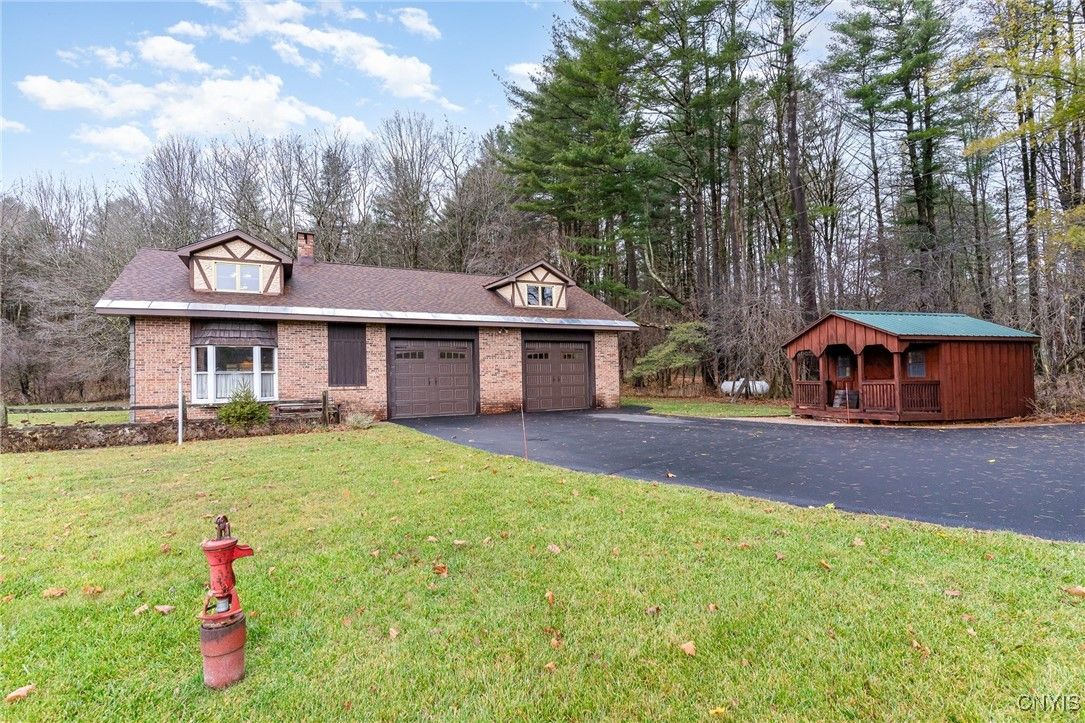 Attached, Backyard, Exterior, Facade, Brick Facade, Cape Cod