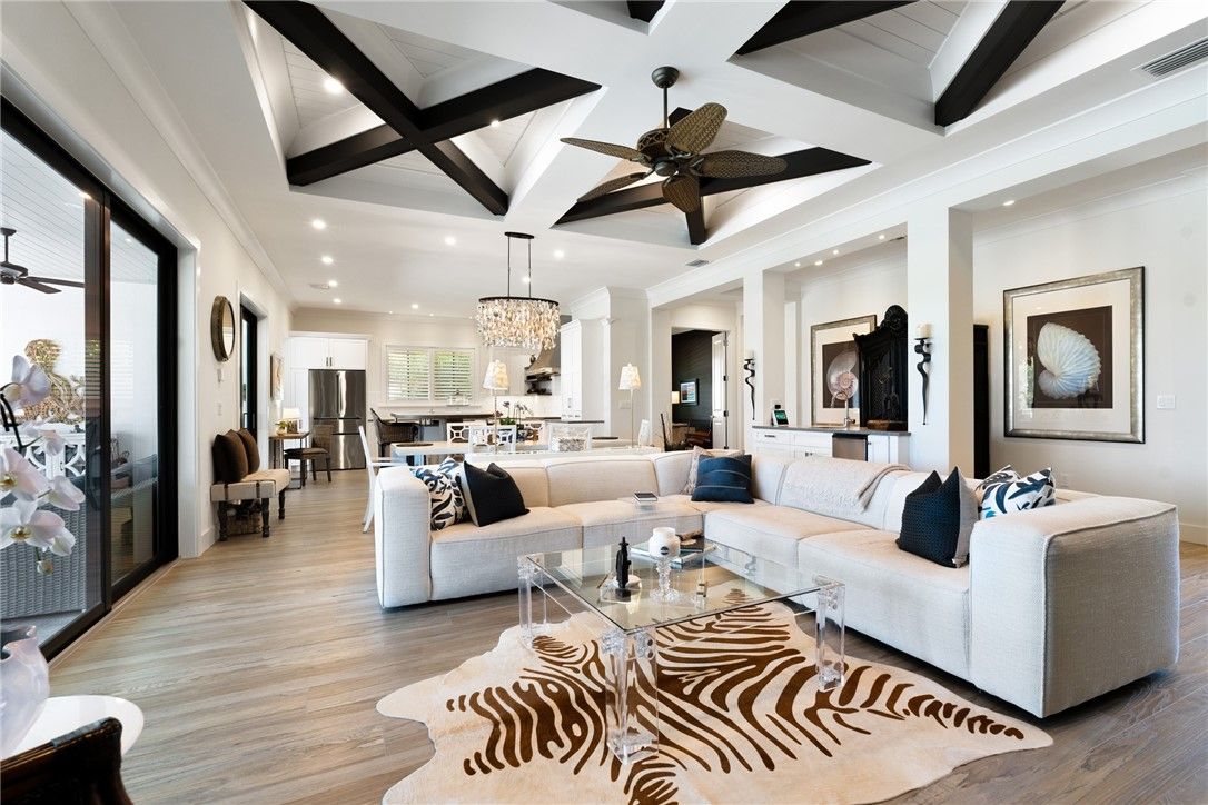 Chandelier, Dining room, Interior, Kitchen, Living room, Pendant Lights, Recessed Lighting, Stainless Steel Appliances, Wood Texture Flooring