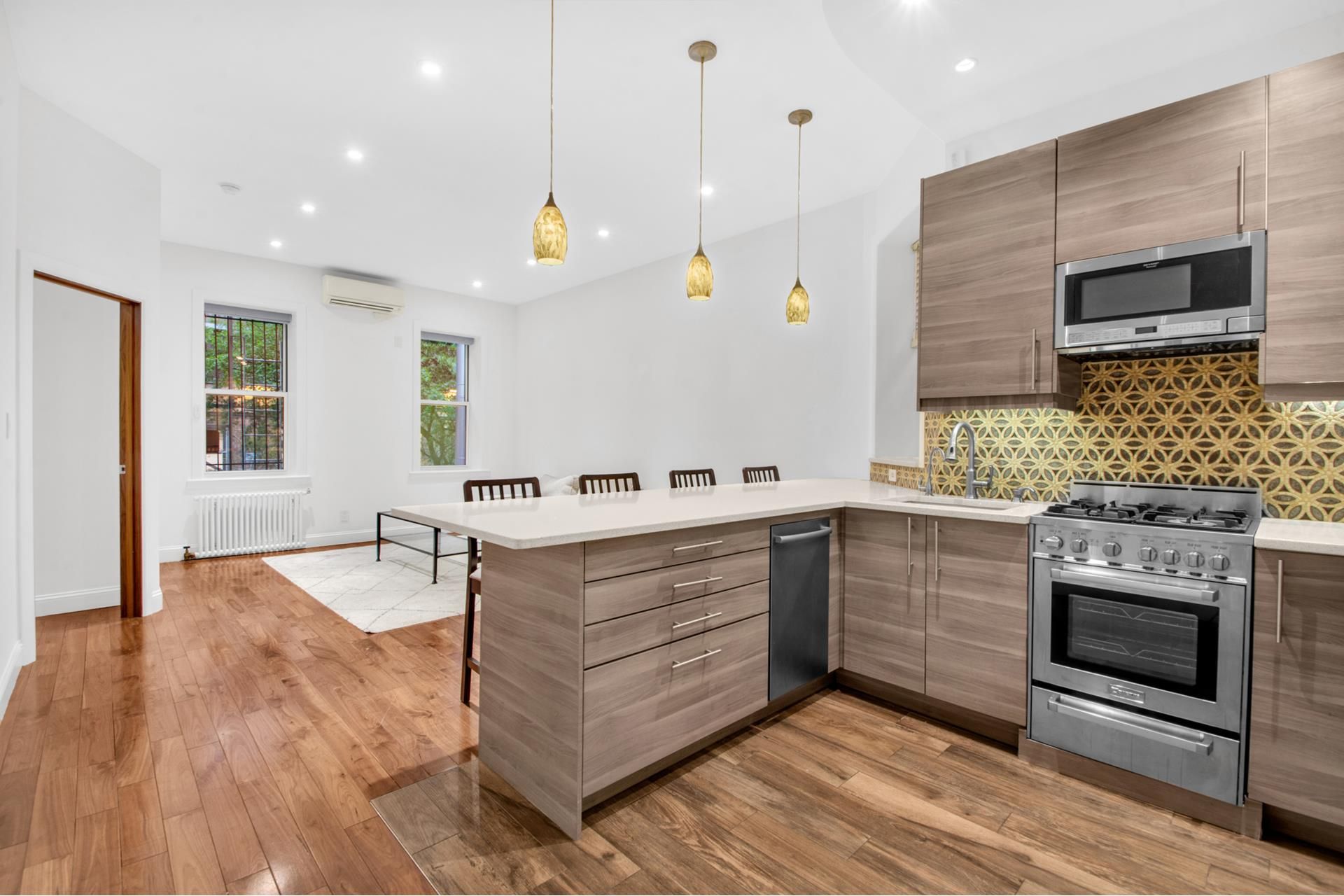 Dining room, Interior, Kitchen, Pendant Lights, Recessed Lighting, Stainless Steel Appliances, Wood Texture Flooring