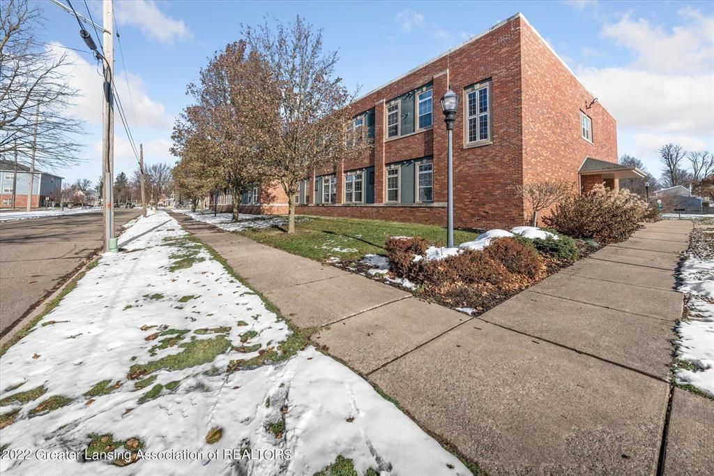 Exterior, Facade, Brick Facade, Condo Building