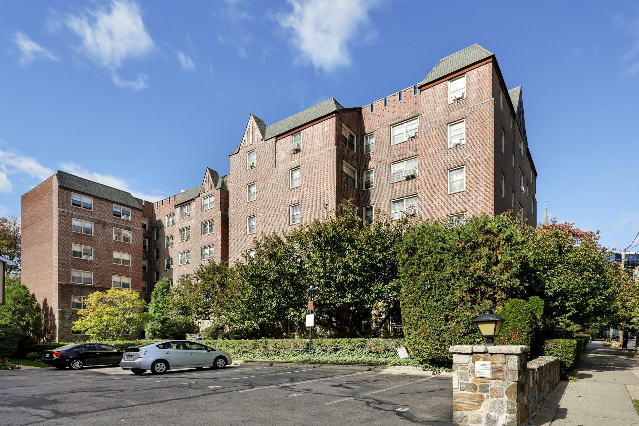 Exterior, Facade, Brick Facade, Condo Building