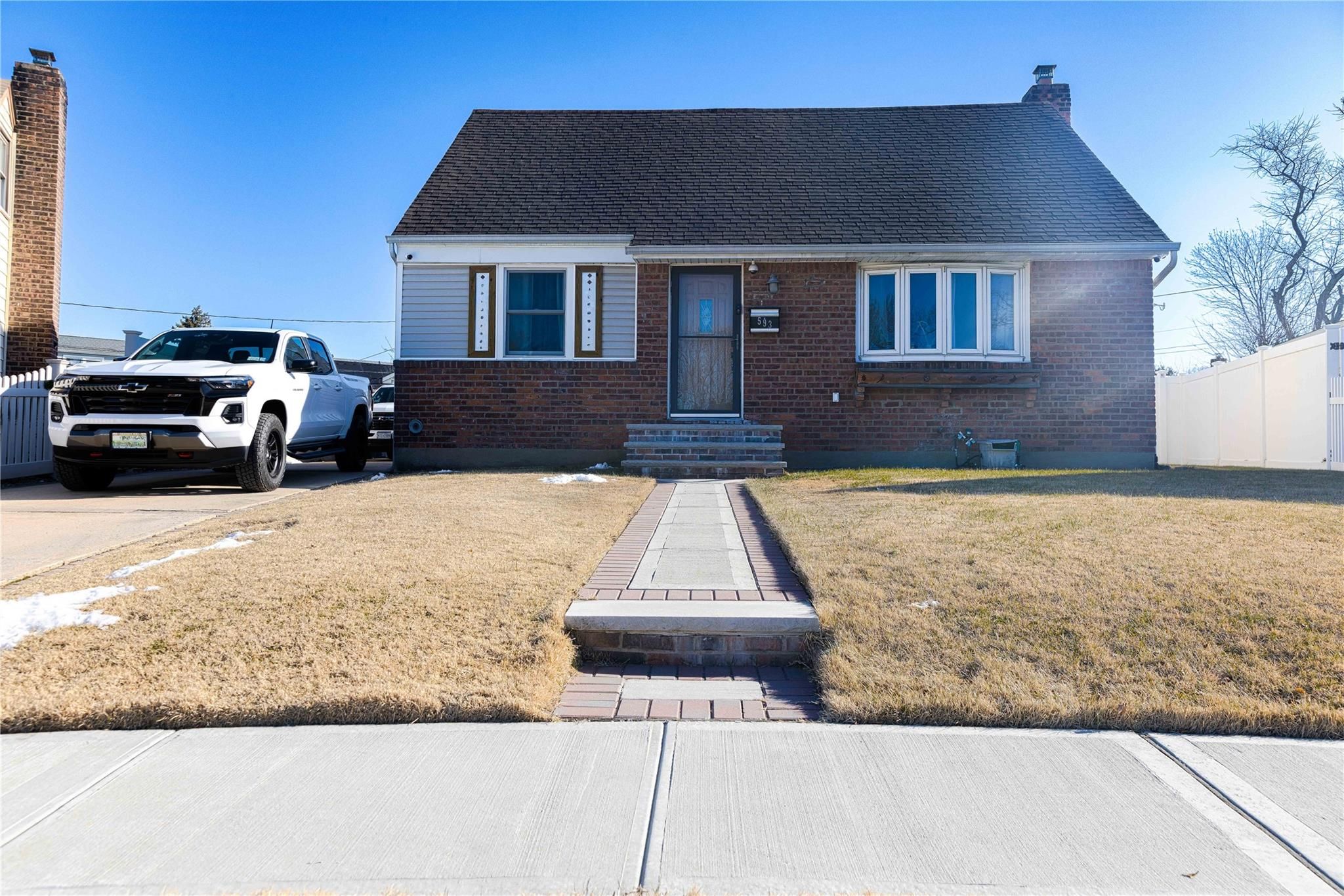 Exterior, Facade, Brick Facade, Cape Cod