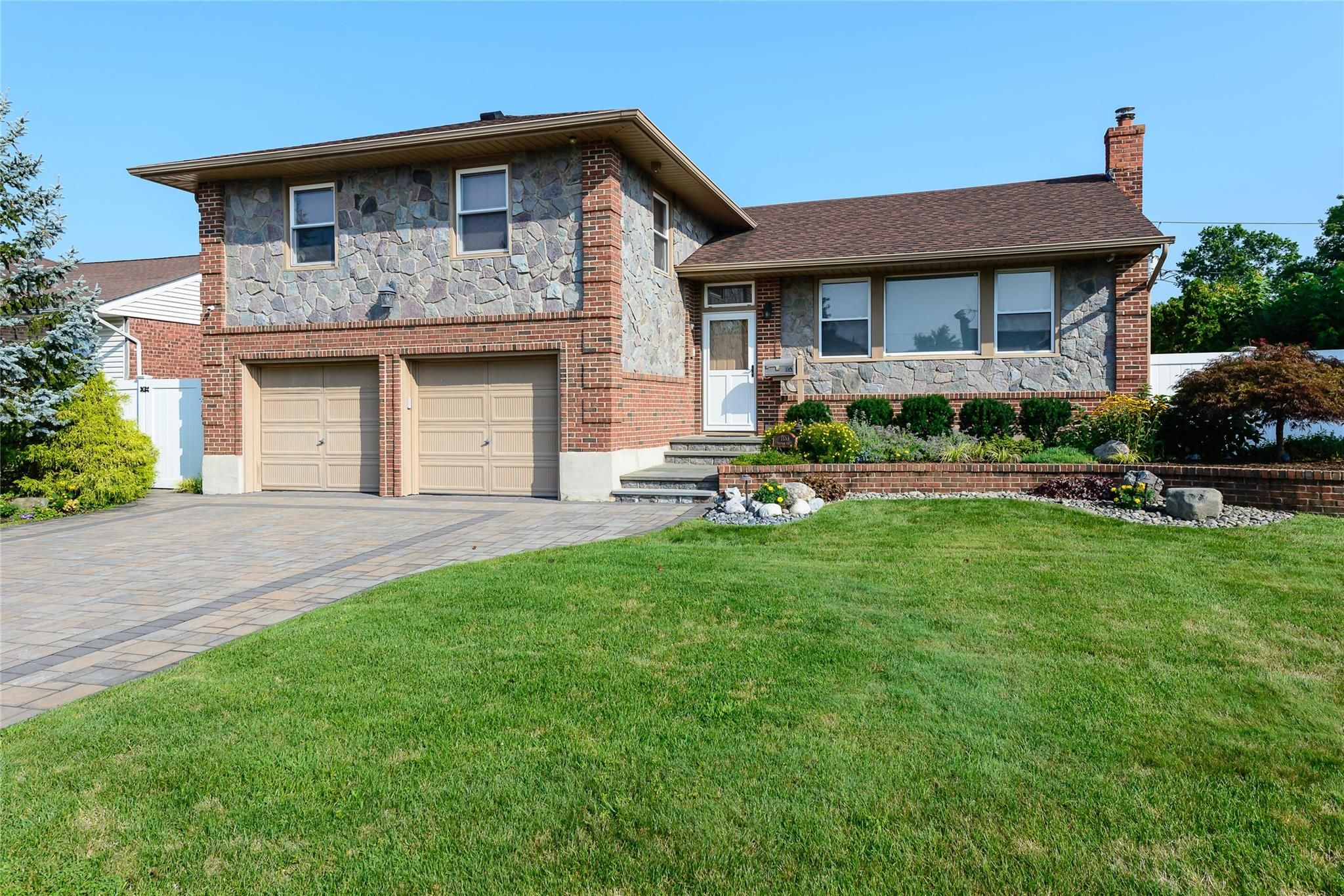 Attached, Exterior, Facade, Brick Facade, Split Level
