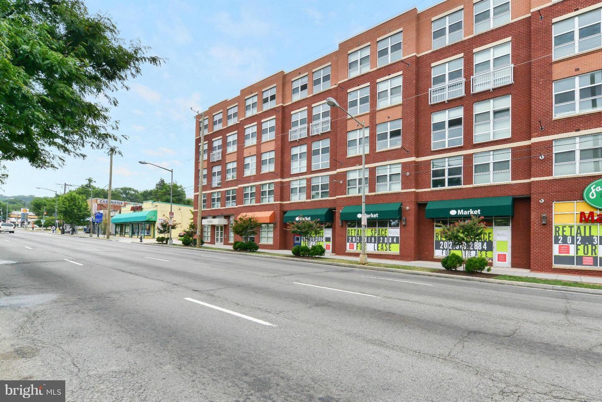 Exterior, Facade, Brick Facade, Condo Building