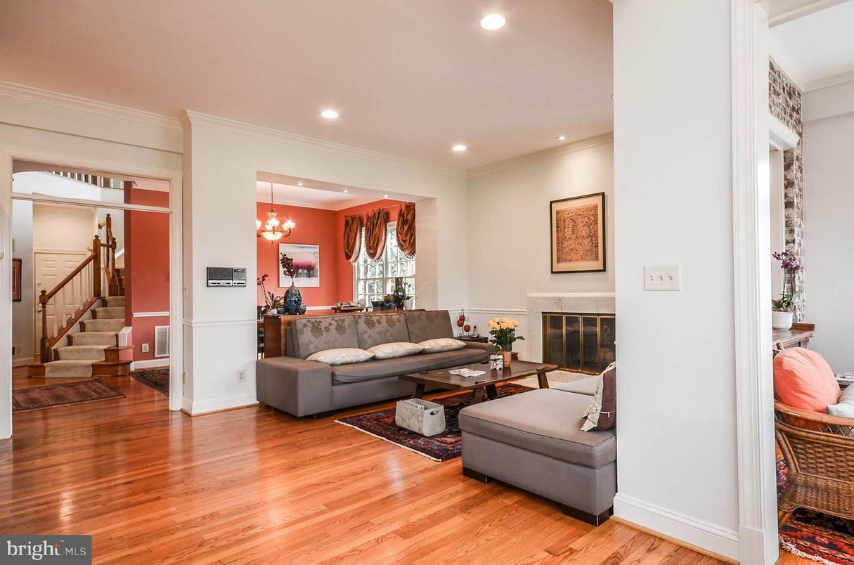 Chandelier, Fireplace, Interior, Living room, Pendant Lights, Recessed Lighting, Wood Texture Flooring
