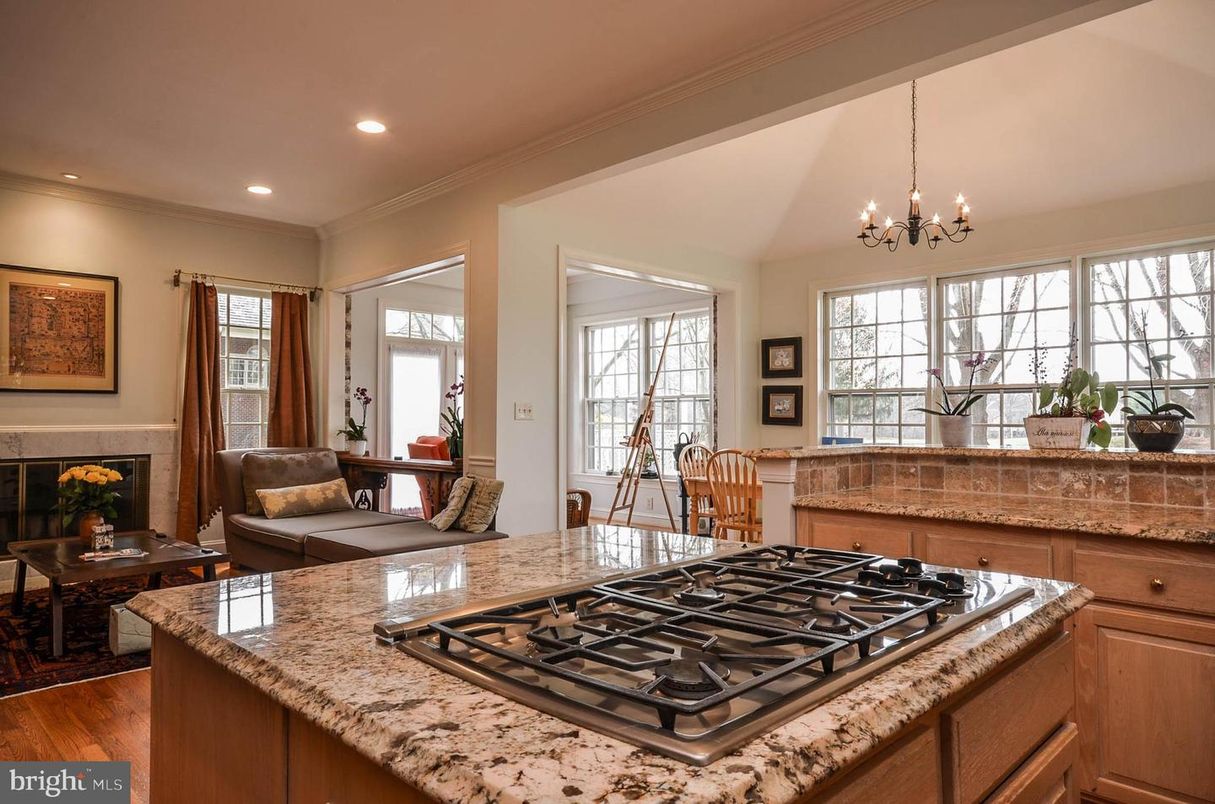 Chandelier, Dining room, Fireplace, Interior, Kitchen, Living room, Recessed Lighting, Wood Texture Flooring