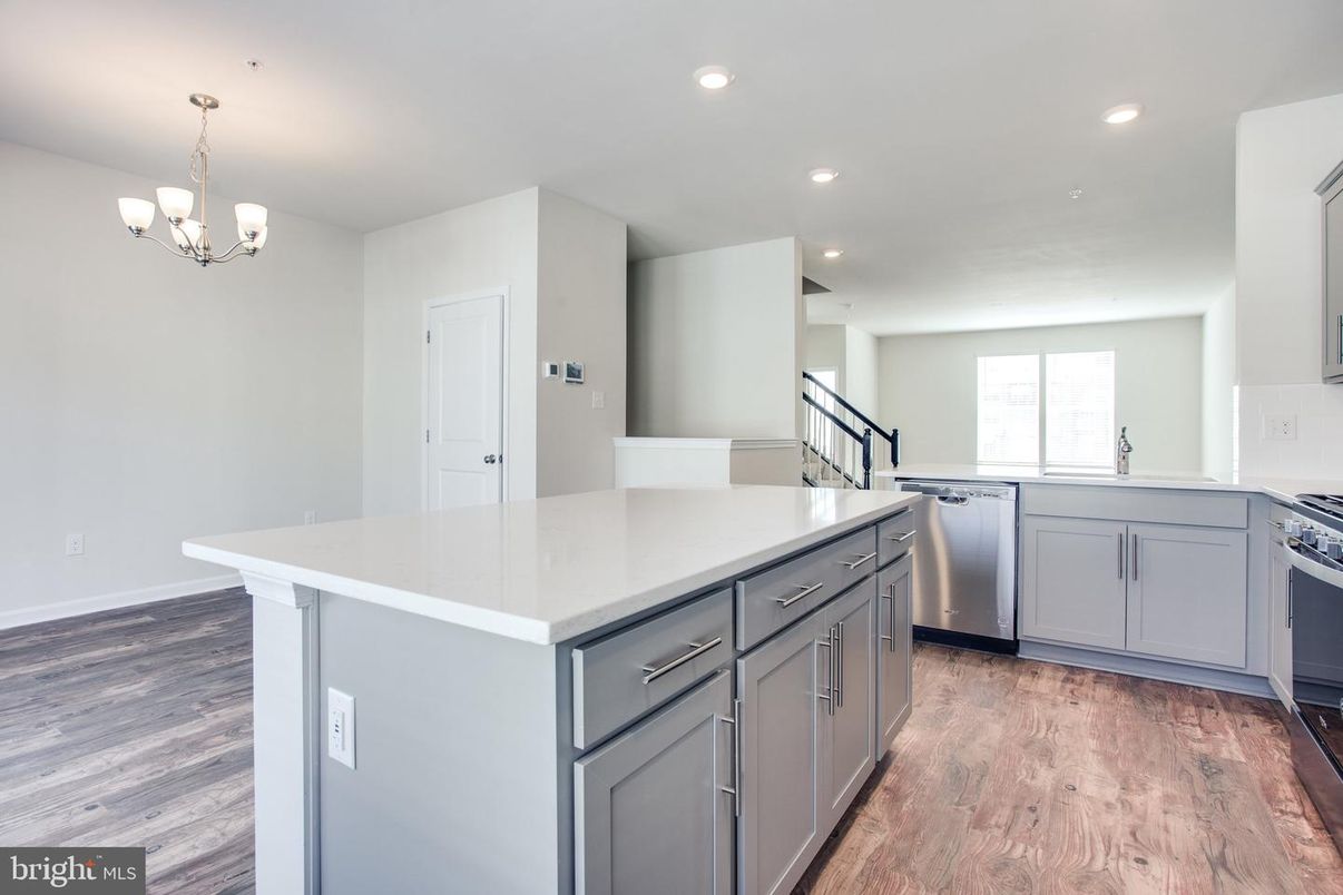 Chandelier, Interior, Kitchen, Recessed Lighting, Stainless Steel Appliances, Wood Texture Flooring