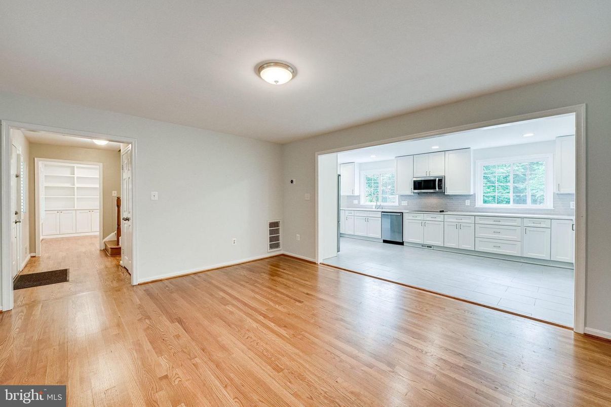 Empty room, Interior, Kitchen, Stainless Steel Appliances, Wood Texture Flooring