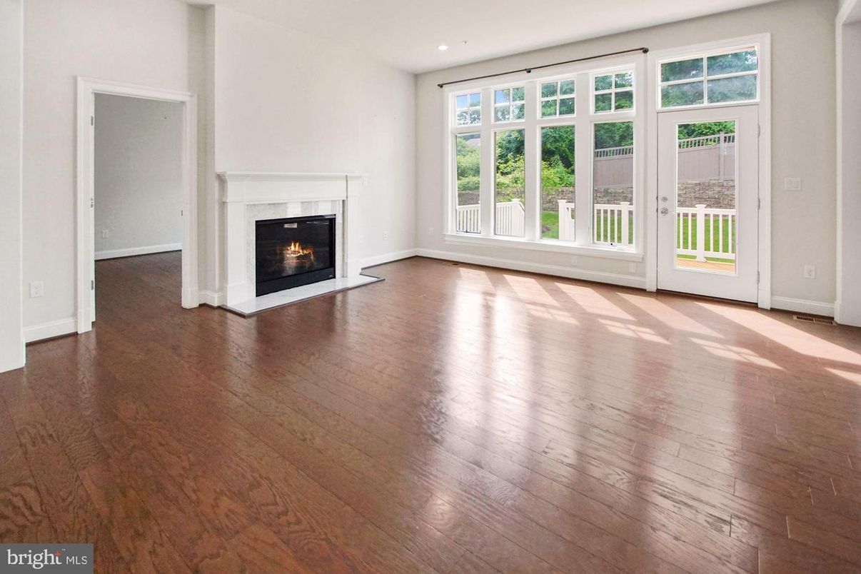 Empty room, Fireplace, Interior, Recessed Lighting, Wood Texture Flooring