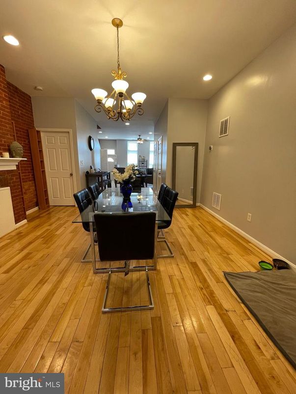 Chandelier, Dining room, Interior, Recessed Lighting, Stone Walls, Wood Texture Flooring
