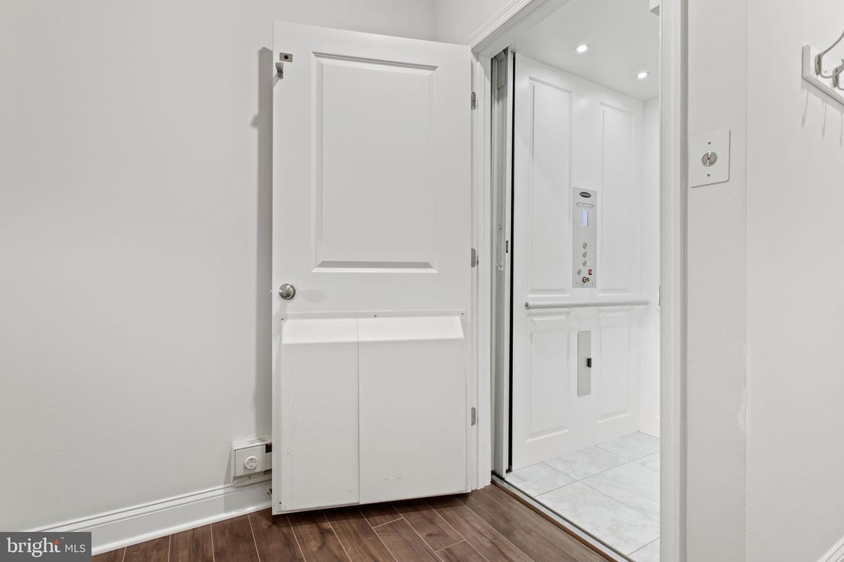 Elevator, Interior, Recessed Lighting, Wood Texture Flooring