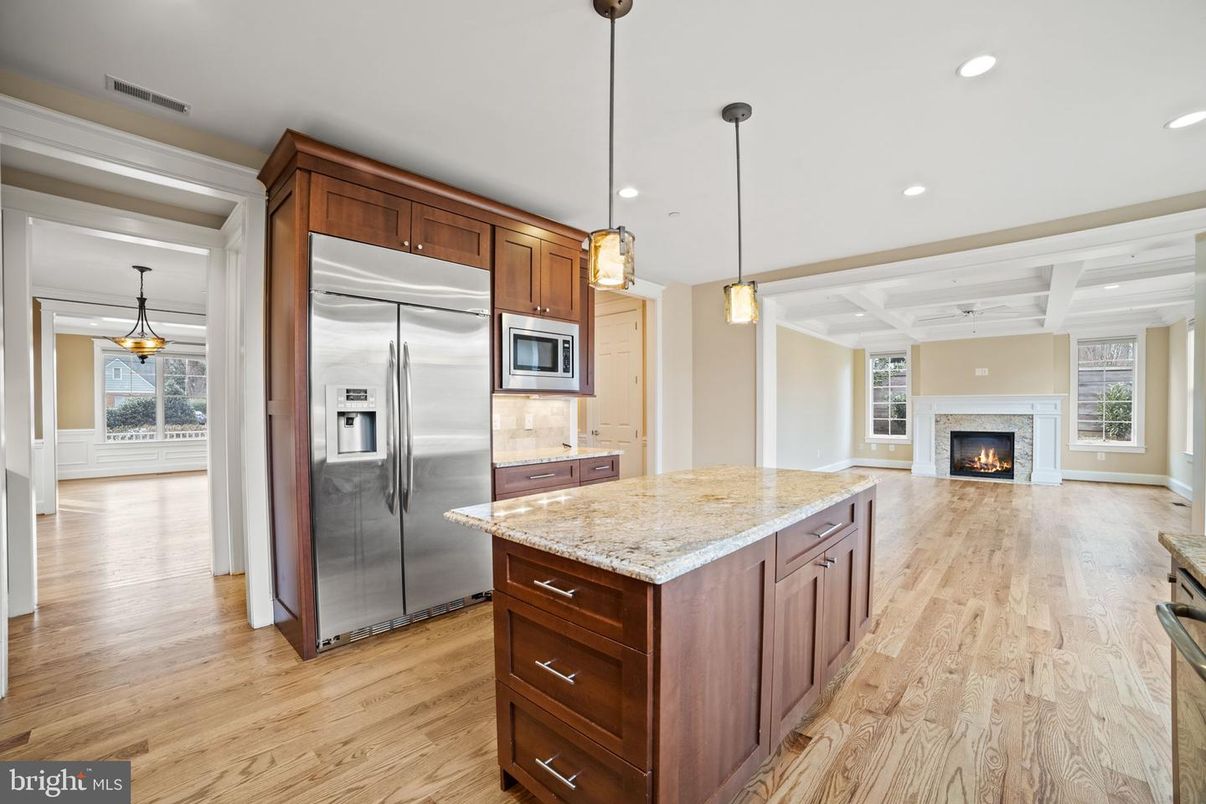 Fireplace, Interior, Kitchen, Pendant Lights, Recessed Lighting, Stainless Steel Appliances, Wood Texture Flooring