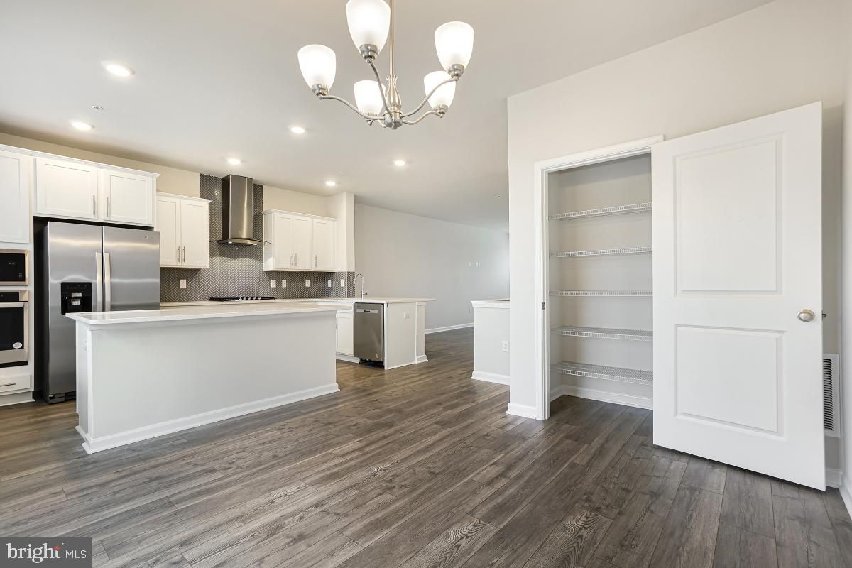 Chandelier, Interior, Kitchen, Recessed Lighting, Stainless Steel Appliances, Wood Texture Flooring