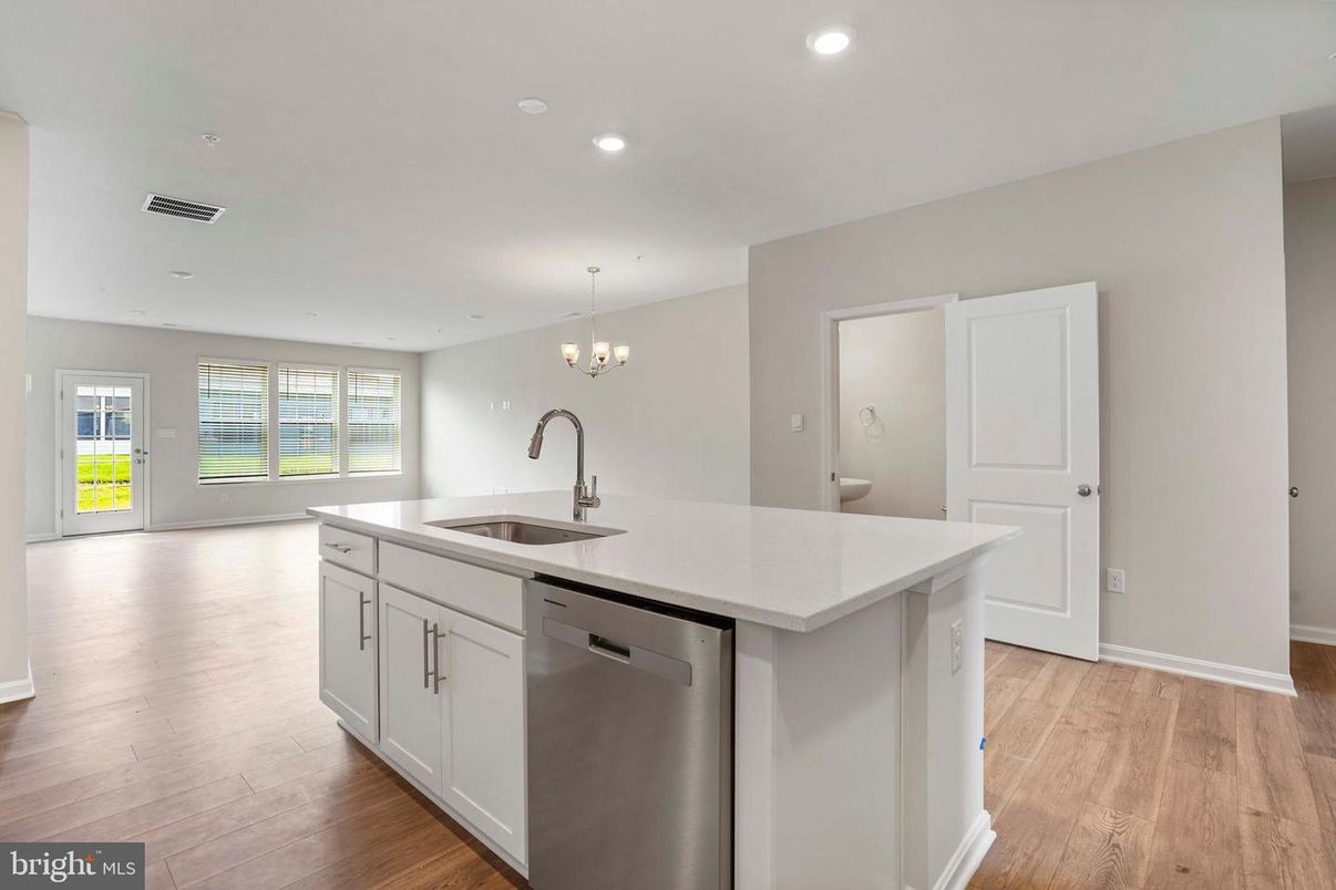 Chandelier, Interior, Kitchen, Recessed Lighting, Stainless Steel Appliances, Wood Texture Flooring