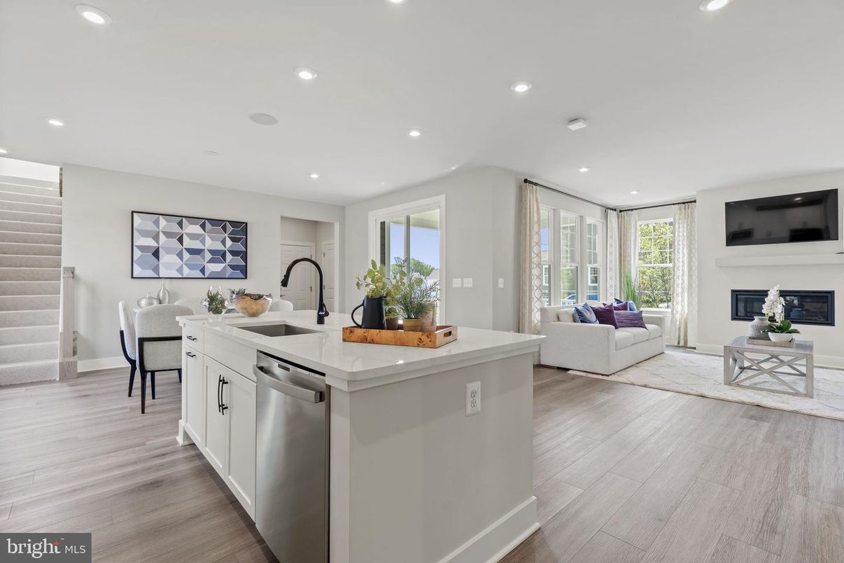 Dining room, Fireplace, Interior, Kitchen, Living room, Recessed Lighting, Wood Texture Flooring