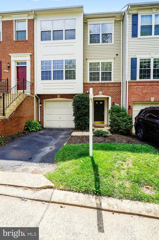 Attached, Exterior, Facade, Brick Facade, Rowhouse