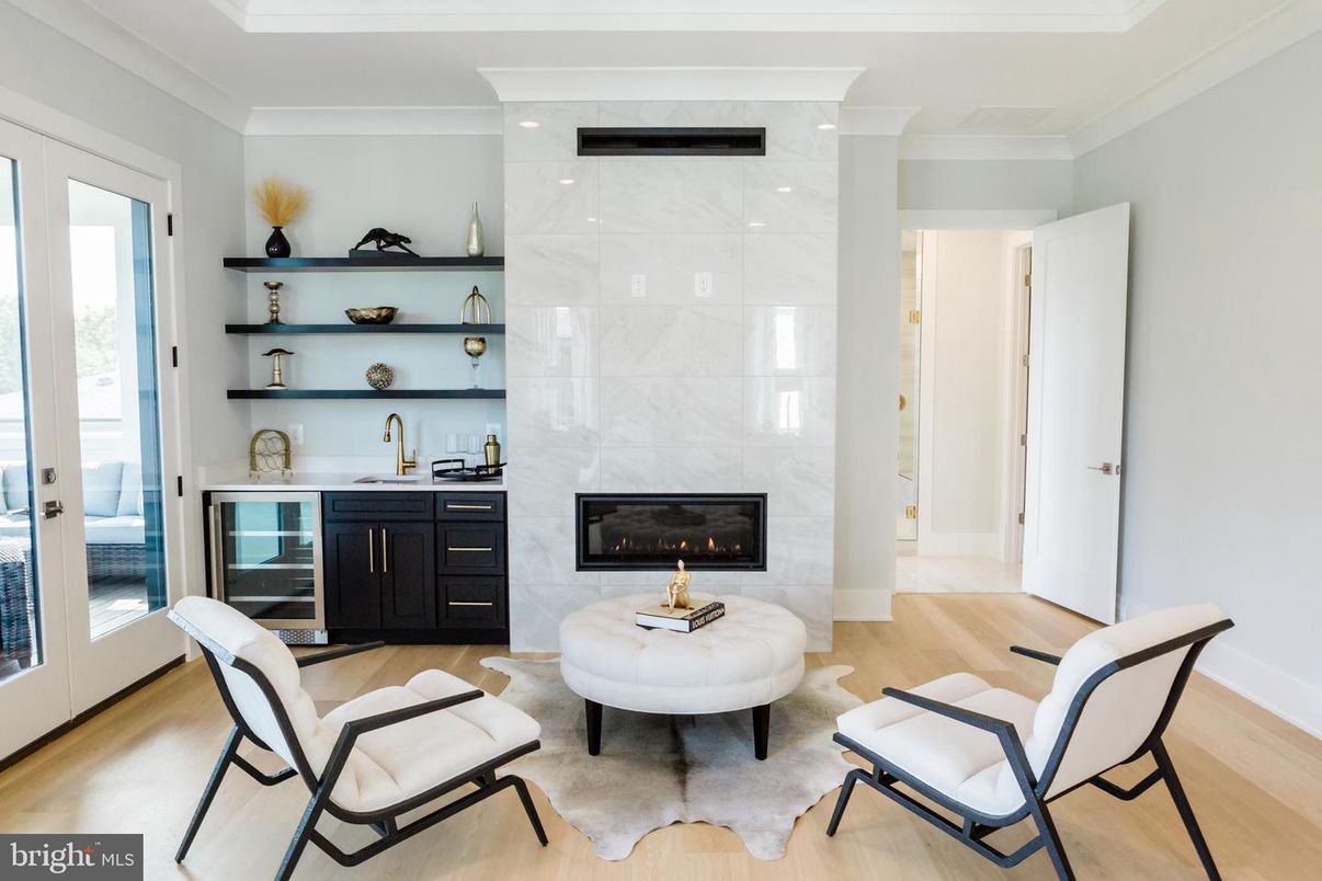 Fireplace, Interior, Marble Walls, Recessed Lighting, Wood Texture Flooring