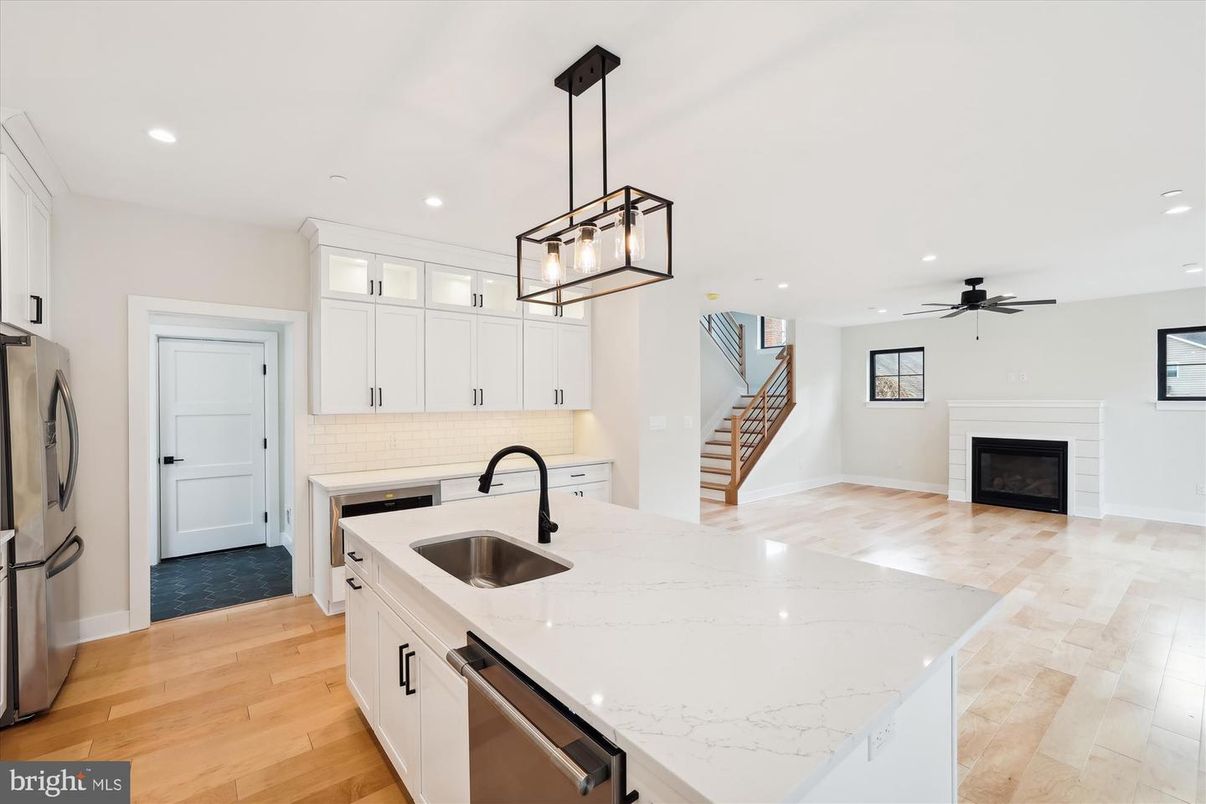 Fireplace, Interior, Kitchen, Pendant Lights, Recessed Lighting, Stainless Steel Appliances, Wood Texture Flooring