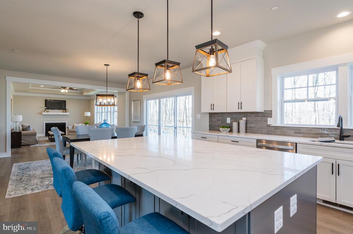 Dining room, Fireplace, Interior, Kitchen, Living room, Pendant Lights, Recessed Lighting, Stainless Steel Appliances, Wood Texture Flooring