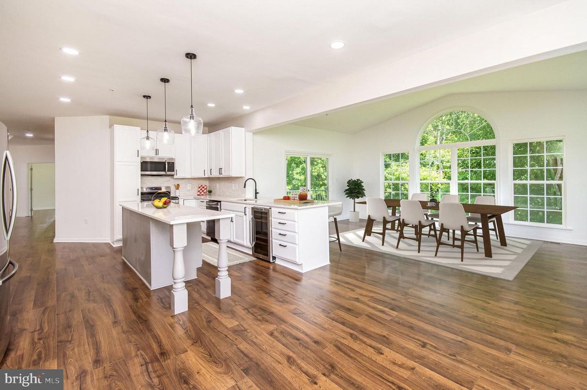 Dining room, Interior, Kitchen, Pendant Lights, Recessed Lighting, Stainless Steel Appliances, Wood Texture Flooring