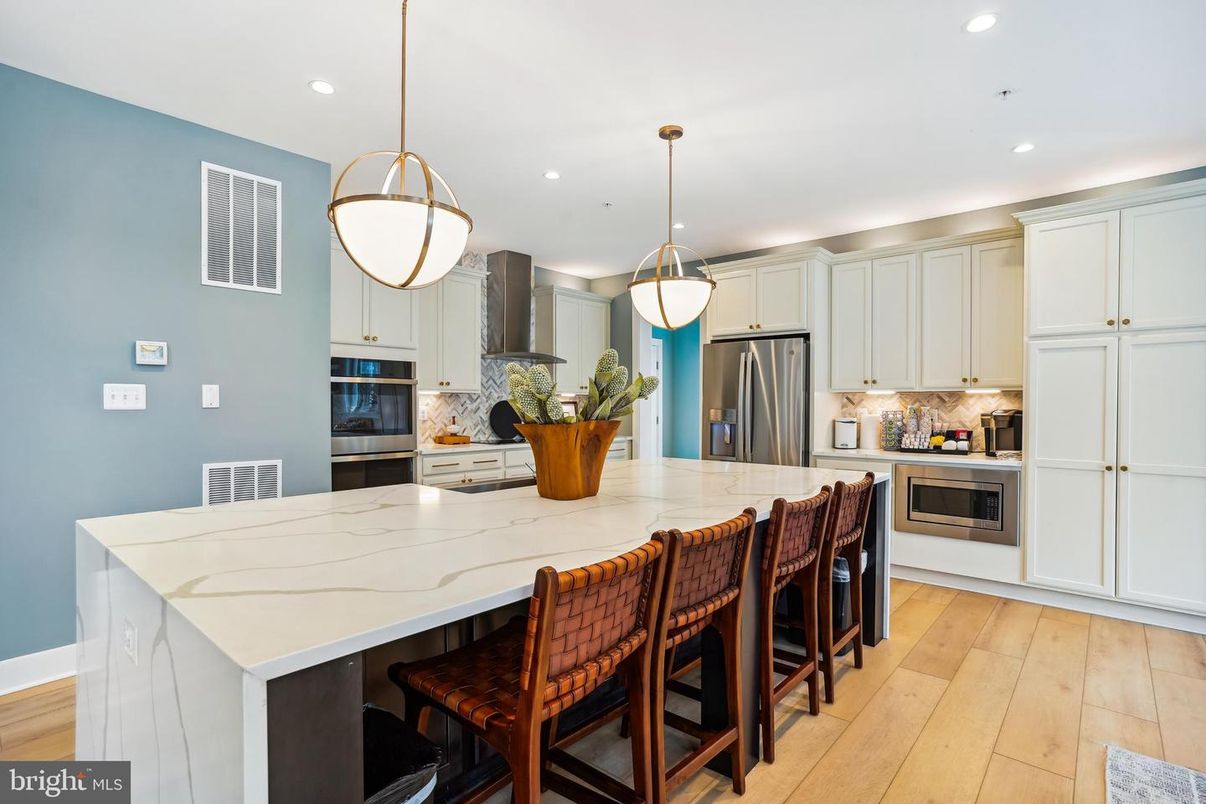 Interior, Kitchen, Pendant Lights, Recessed Lighting, Stainless Steel Appliances, Wood Texture Flooring