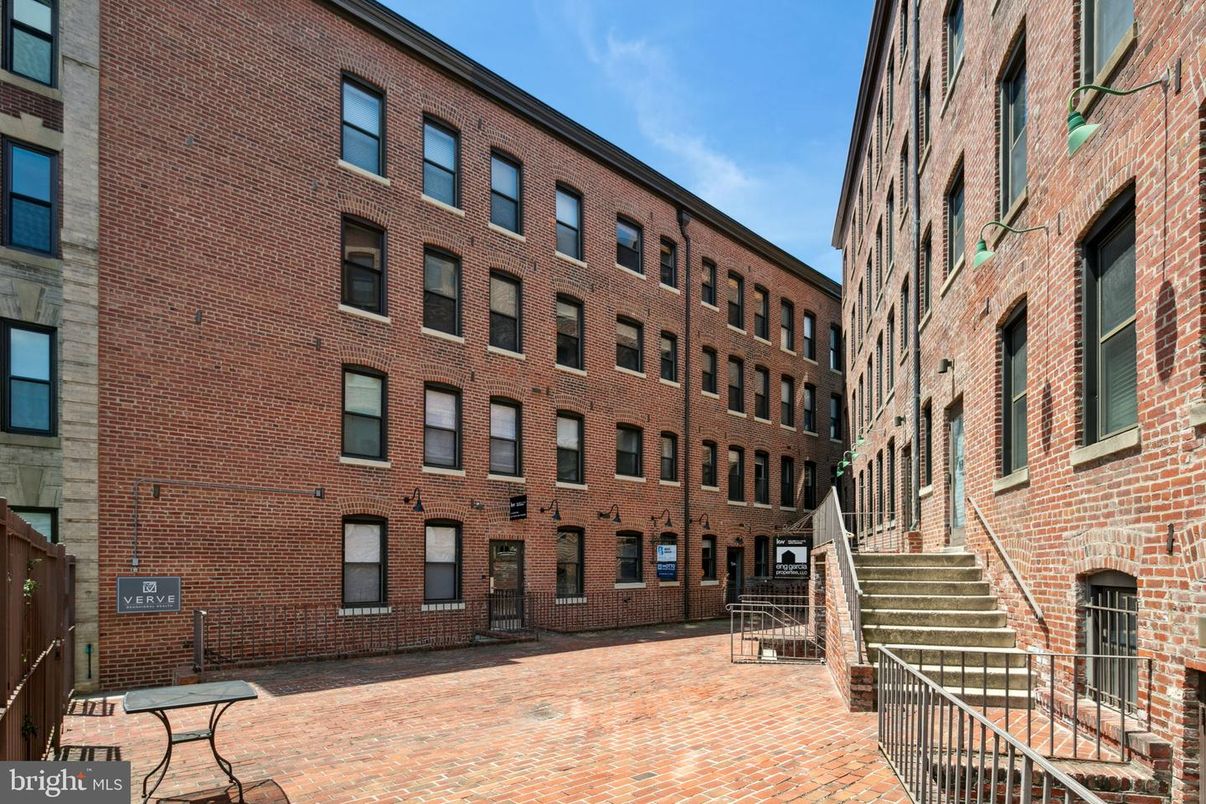 Exterior, Facade, Brick Facade, Condo Building