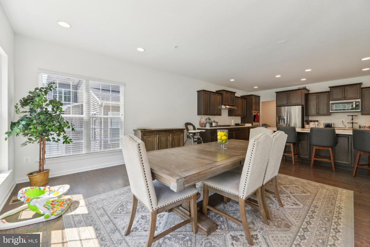 Dining room, Interior, Kitchen, Recessed Lighting, Stainless Steel Appliances, Wood Texture Flooring