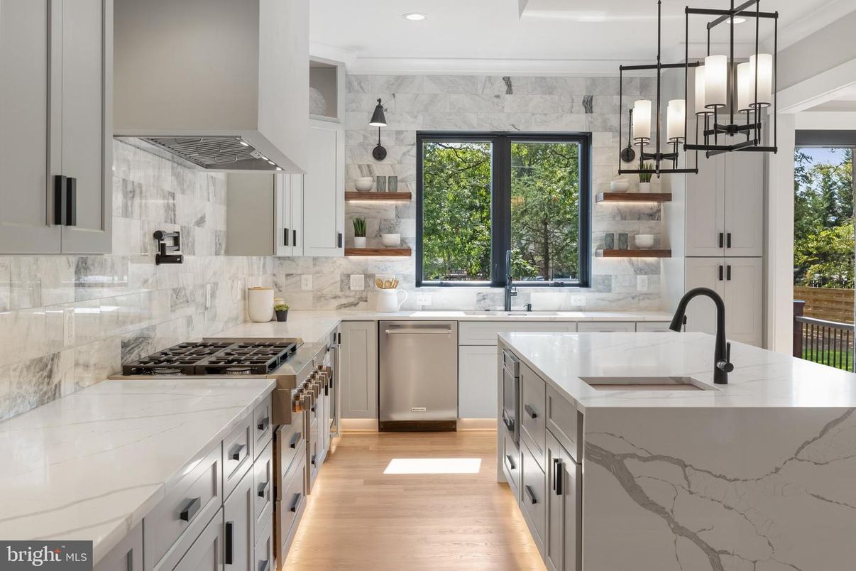 Interior, Kitchen, Marble Walls, Pendant Lights, Recessed Lighting, Stainless Steel Appliances, Wood Texture Flooring