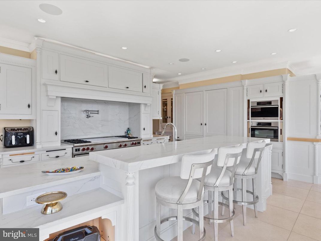 Interior, Kitchen, Marble Walls, Recessed Lighting, Stainless Steel Appliances