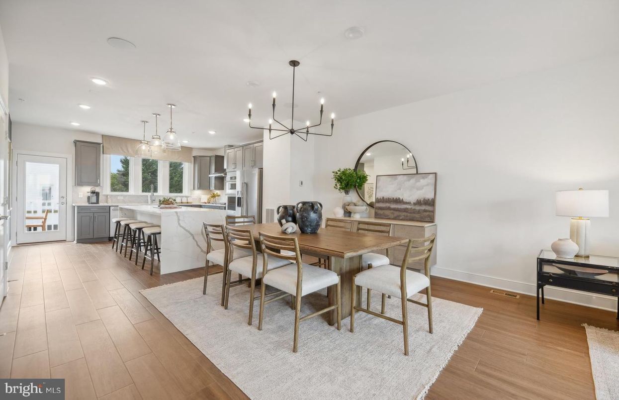 Dining room, Interior, Kitchen, Pendant Lights, Recessed Lighting, Stainless Steel Appliances, Wood Texture Flooring