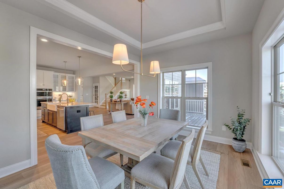 Dining room, Interior, Kitchen, Pendant Lights, Recessed Lighting, Stainless Steel Appliances, Wood Texture Flooring