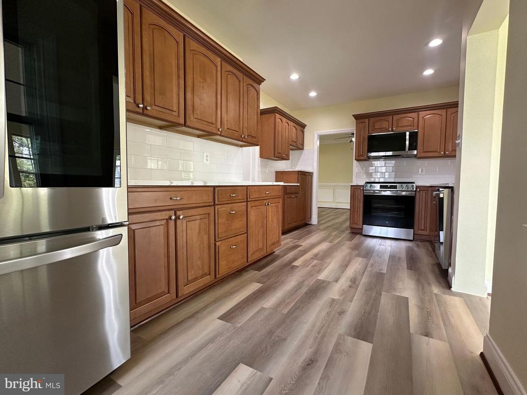 Interior, Kitchen, Recessed Lighting, Stainless Steel Appliances, Wood Texture Flooring