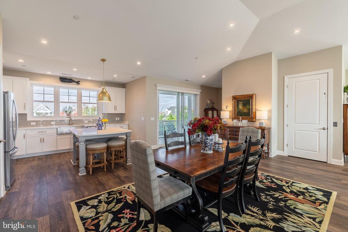 Dining room, Interior, Kitchen, Pendant Lights, Recessed Lighting, Stainless Steel Appliances, Wood Texture Flooring