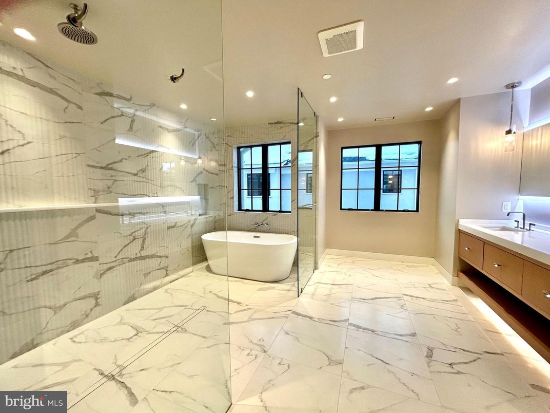 Bathroom, Dual Sink Vanities, Free Standing Baths, Glass Shower, Interior, Marble, Marble Walls, Recessed Lighting