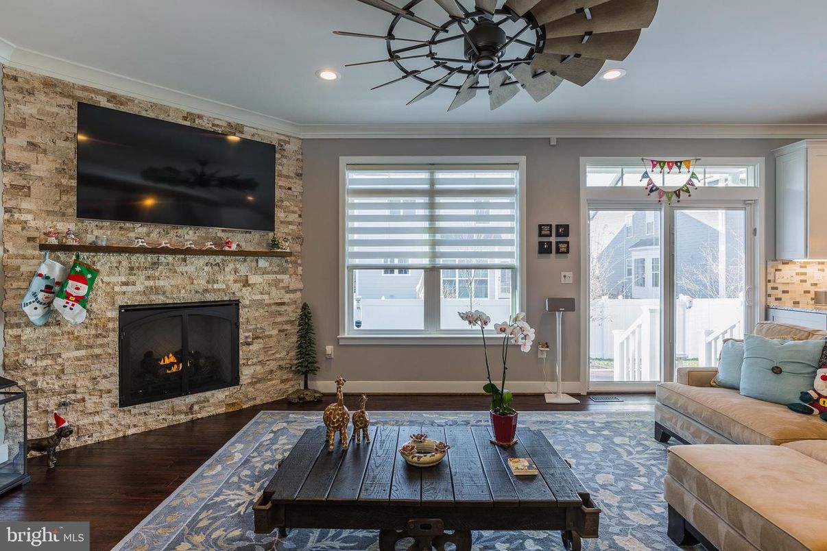 Fireplace, Interior, Living room, Recessed Lighting, Stone Walls, Wood Texture Flooring