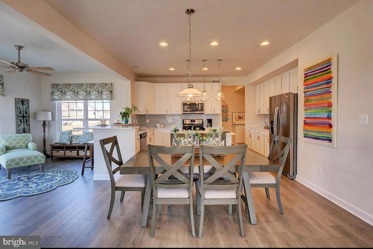 Dining room, Interior, Kitchen, Pendant Lights, Recessed Lighting, Stainless Steel Appliances, Wood Texture Flooring