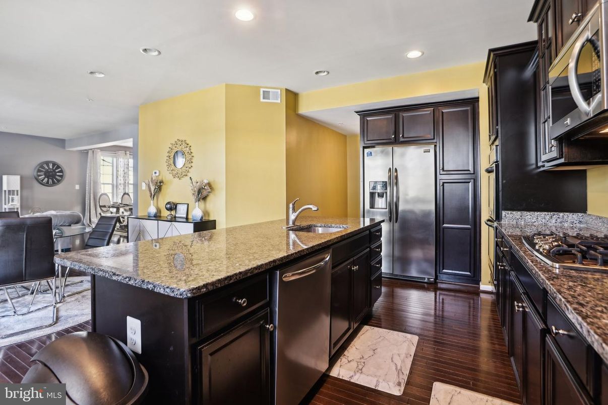 Dining room, Interior, Kitchen, Recessed Lighting, Stainless Steel Appliances, Wood Texture Flooring
