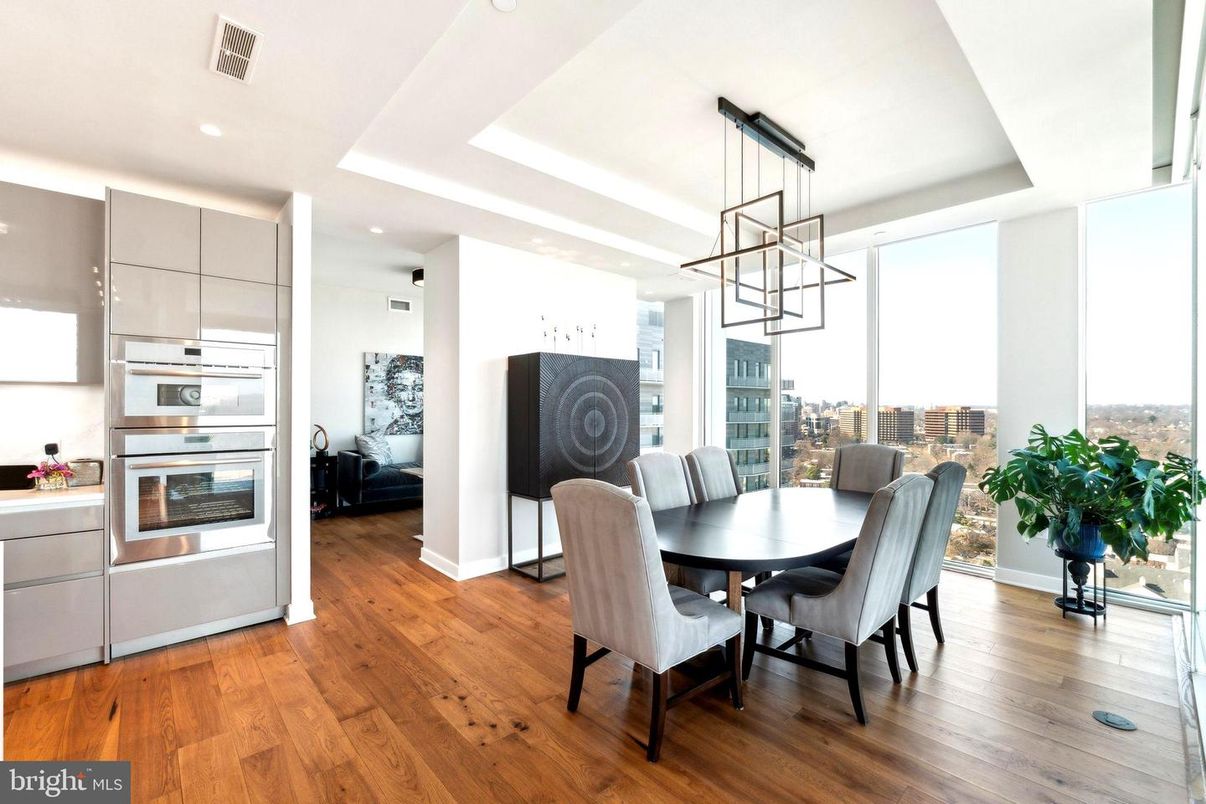 Dining room, Interior, Kitchen, Pendant Lights, Recessed Lighting, Stainless Steel Appliances, Wood Texture Flooring