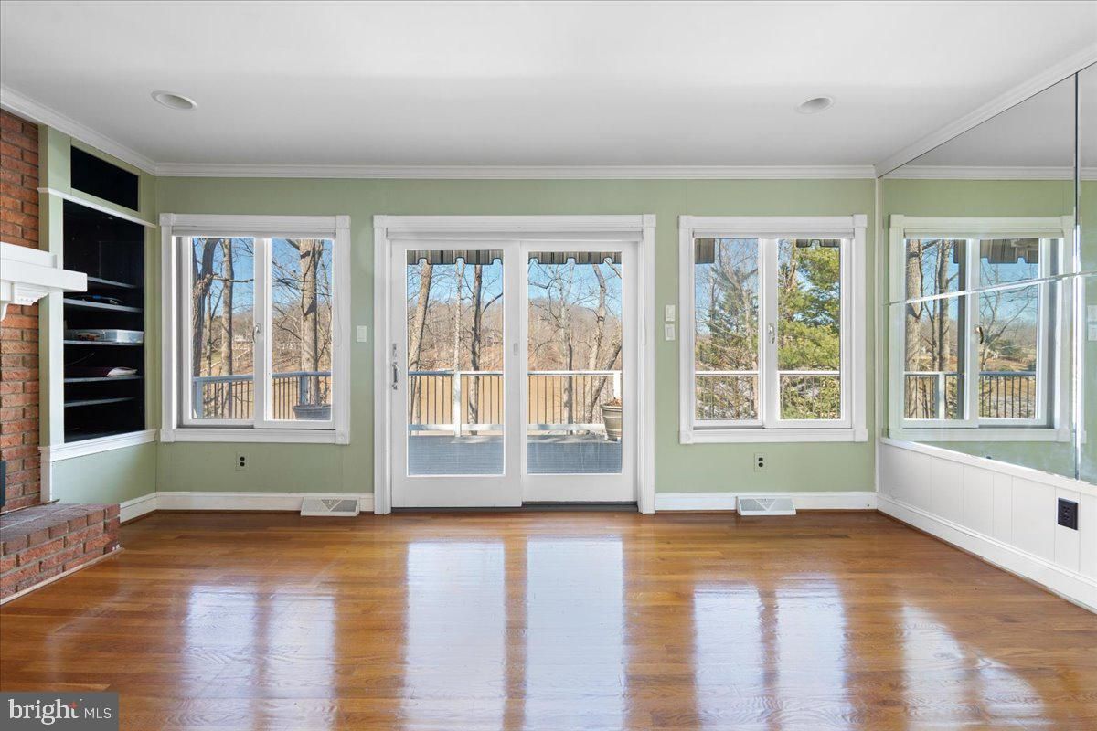 Empty room, Fireplace, Interior, Recessed Lighting, Stone Walls, Wood Texture Flooring