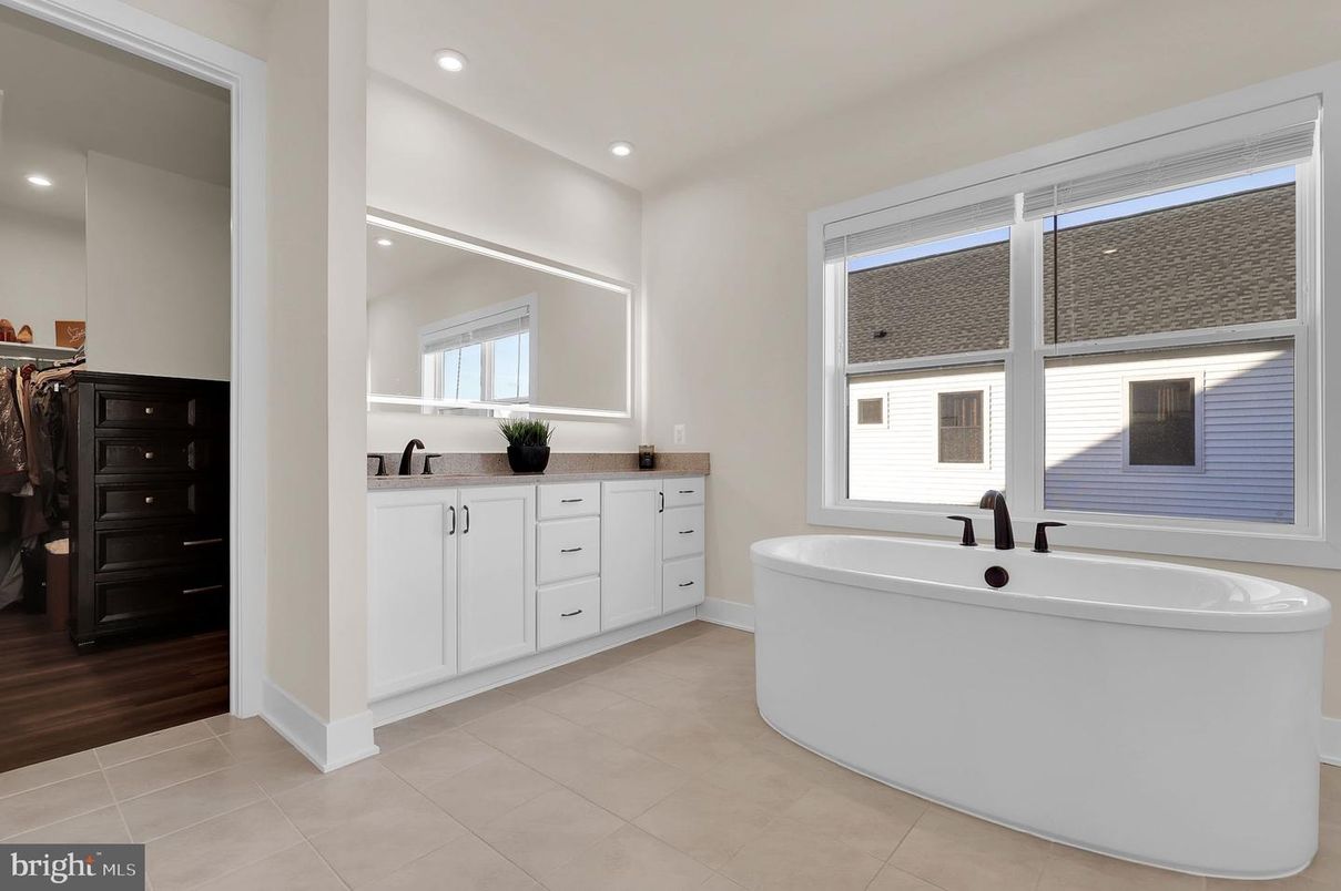Bathroom, Dual Sink Vanities, Free Standing Baths, Interior, Recessed Lighting, Wood Texture Flooring