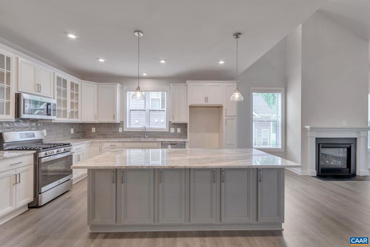 Fireplace, Interior, Kitchen, Pendant Lights, Recessed Lighting, Stainless Steel Appliances, Wood Texture Flooring