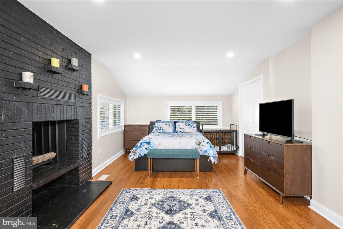 Bedroom, Fireplace, Interior, Recessed Lighting, Wood Texture Flooring