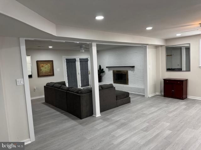 Fireplace, Interior, Living room, Recessed Lighting, Stone Walls, Wood Texture Flooring
