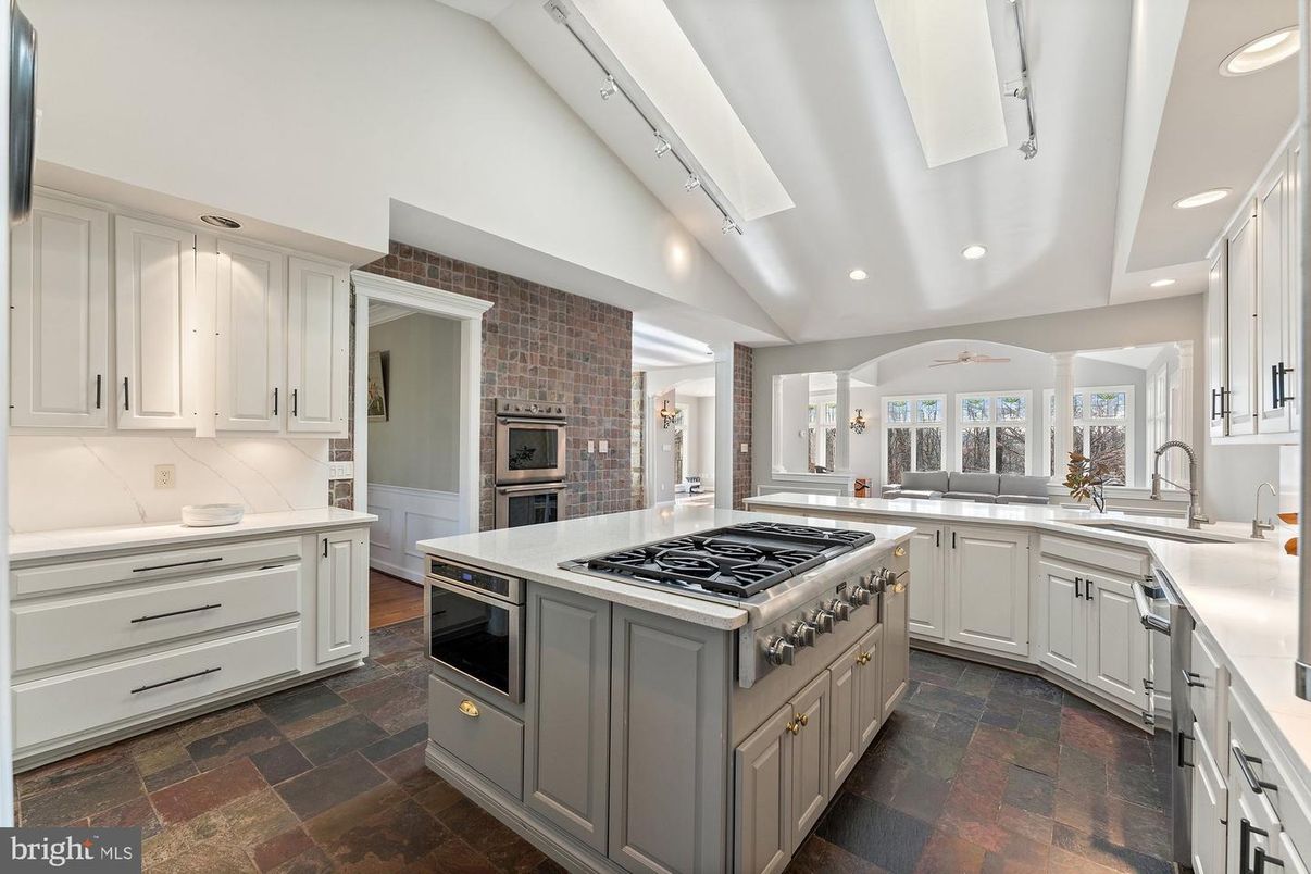 Interior, Kitchen, Recessed Lighting, Stainless Steel Appliances, Stone Walls