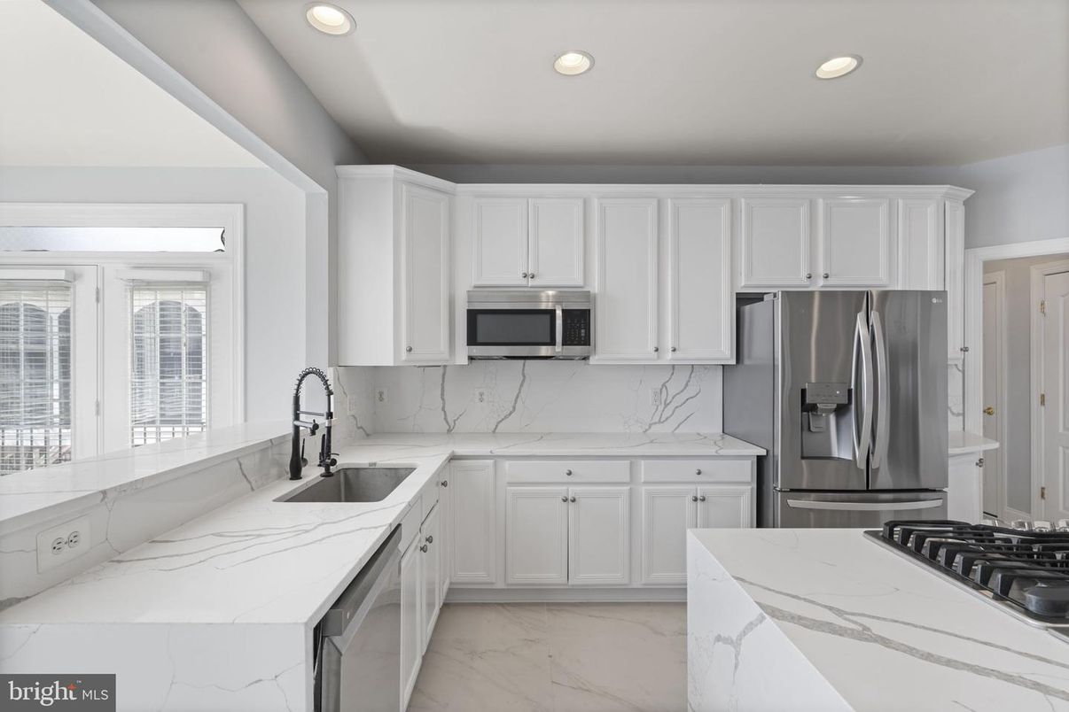 Interior, Kitchen, Marble, Marble Walls, Recessed Lighting, Stainless Steel Appliances