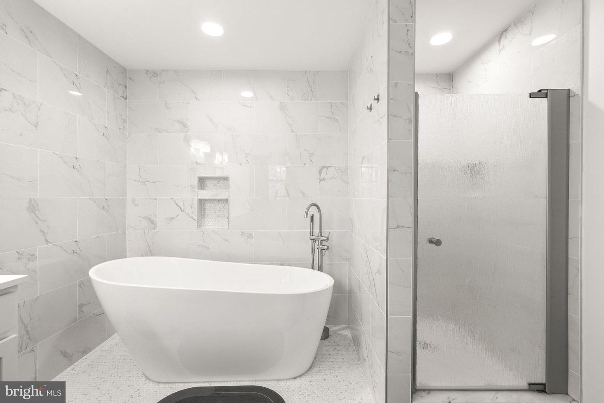 Bathroom, Free Standing Baths, Glass Shower, Interior, Marble Walls, Recessed Lighting