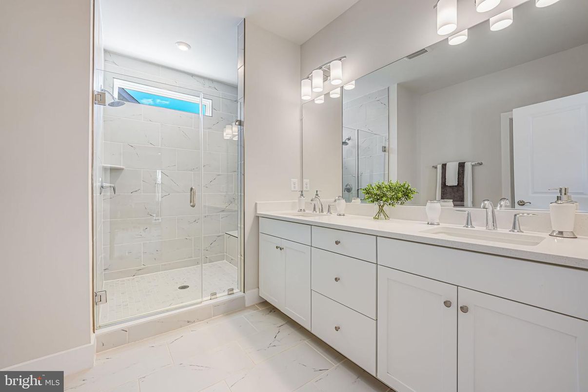 Bathroom, Dual Sink Vanities, Glass Shower, Interior, Marble, Marble Walls, Recessed Lighting
