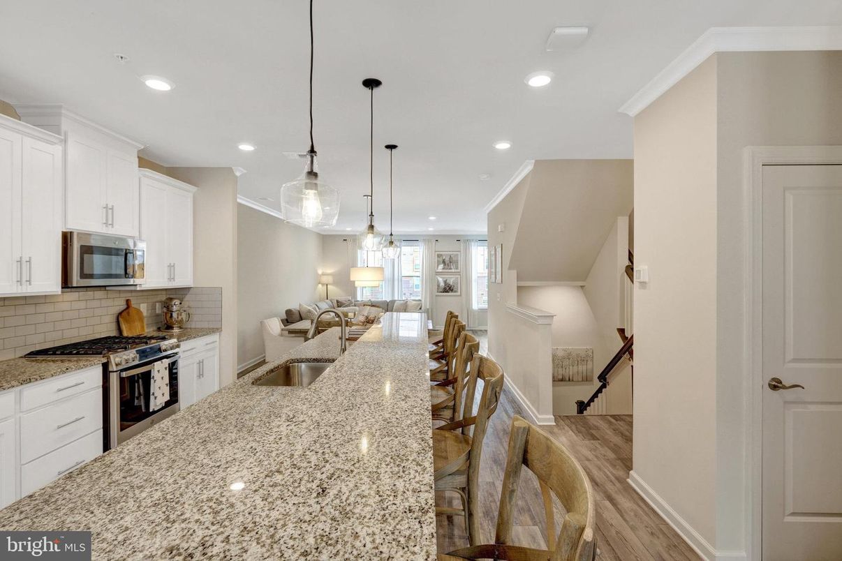 Dining room, Interior, Kitchen, Pendant Lights, Recessed Lighting, Stainless Steel Appliances, Wood Texture Flooring