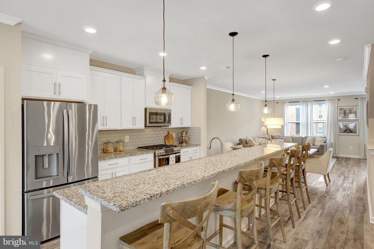 Dining room, Interior, Kitchen, Living room, Pendant Lights, Recessed Lighting, Stainless Steel Appliances, Wood Texture Flooring
