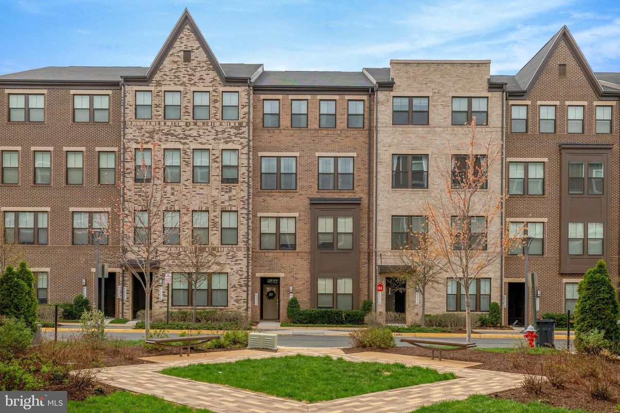 Exterior, Facade, Brick Facade, Condo Building